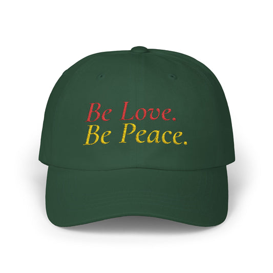 Be Love. Be Peace. Dad Hat in Spruce Green with warm-toned embroidery